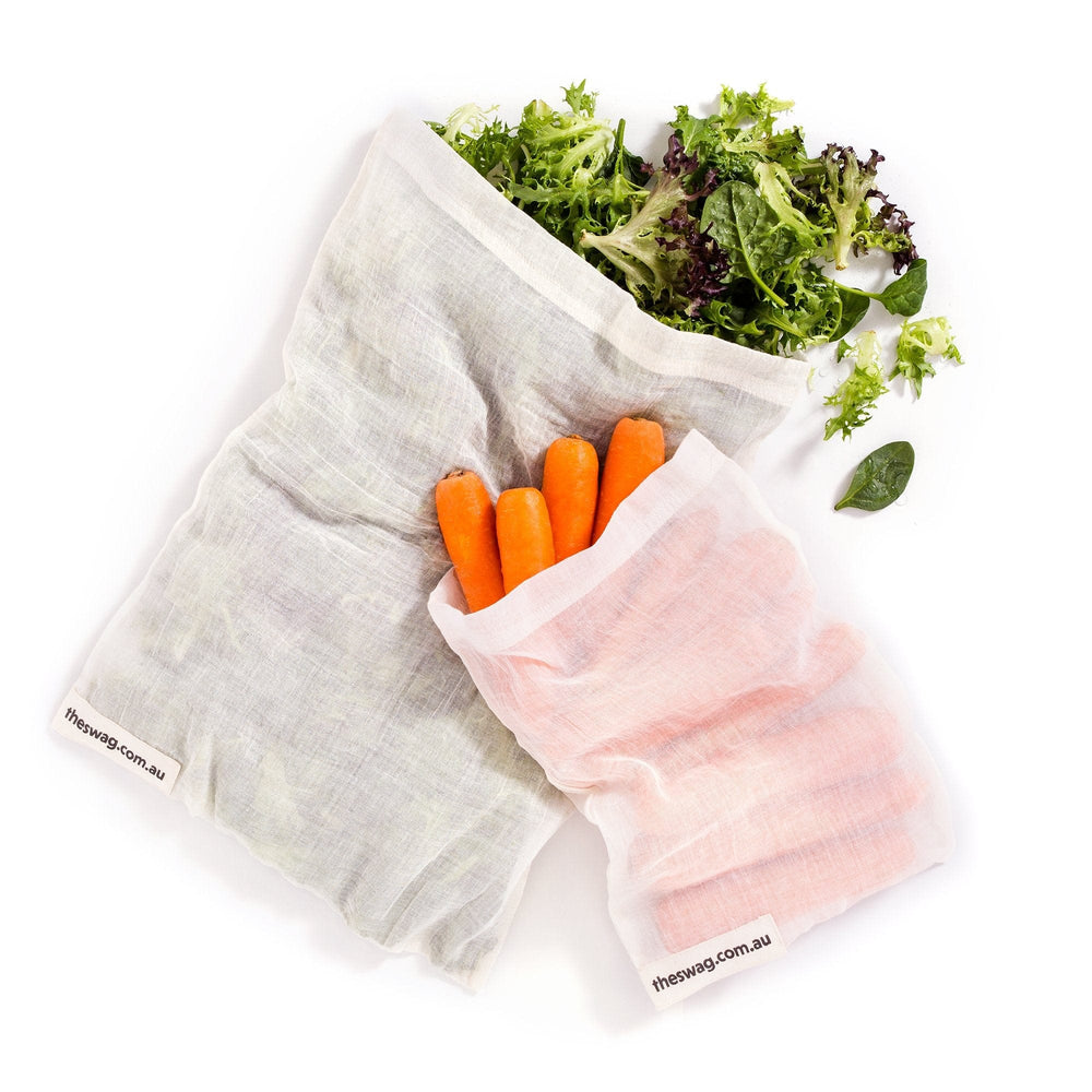 
                      
                        Small and large reusable Swag produce bags filled with loose lettuce leaves and mini carrots  - The Swag AU
                      
                    