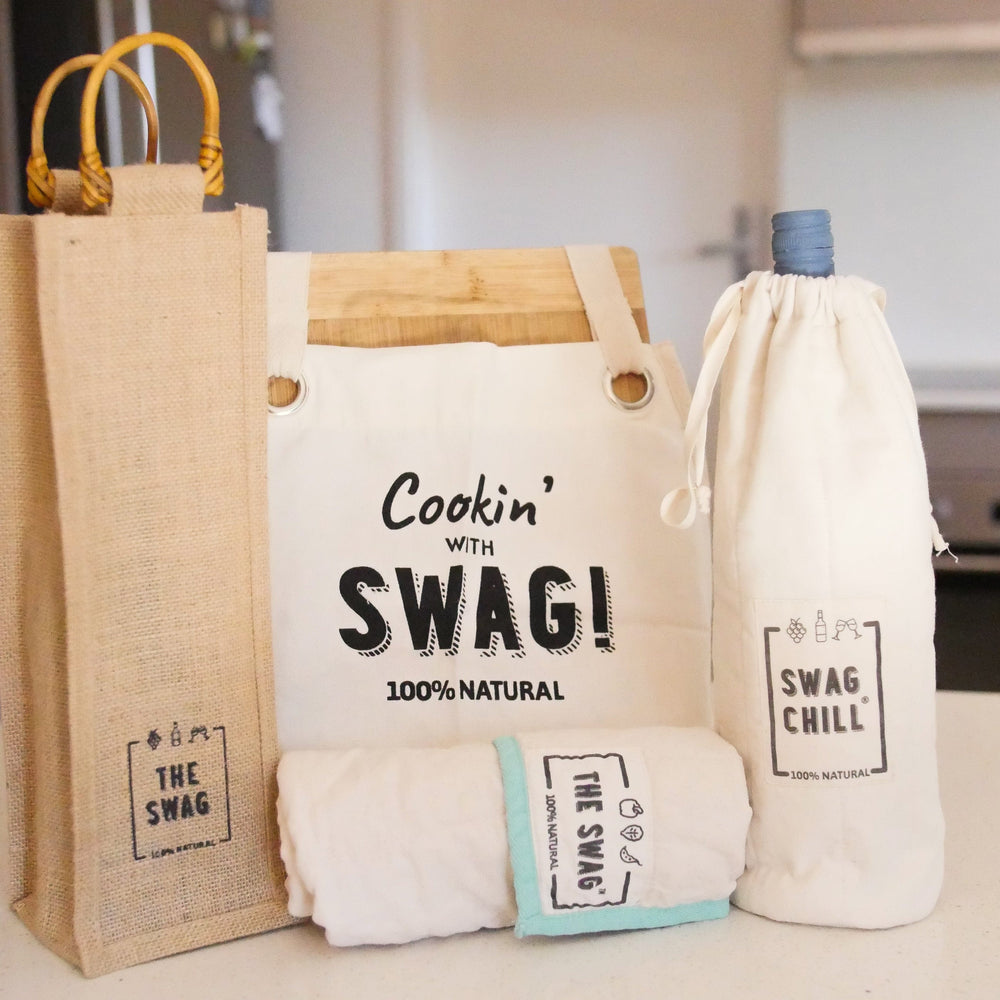The Swag Fathers Day bundle featuring all products sitting on the kitchen beach - The Swag AU

