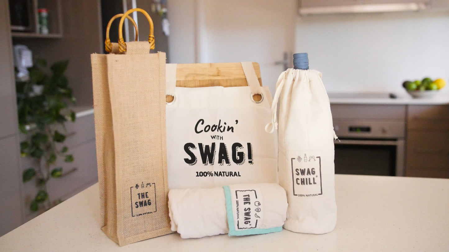 The Swag Fathers Day bundle featuring all products sitting on the kitchen beach - The Swag AU

