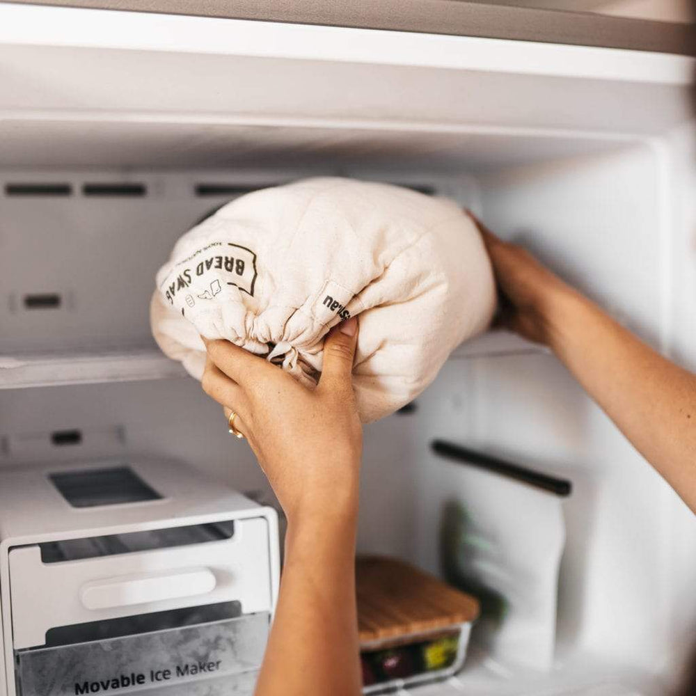
                      
                        The Swag reusable Bread Swag full of bread and being placed into the freezer - The Swag AU
                      
                    