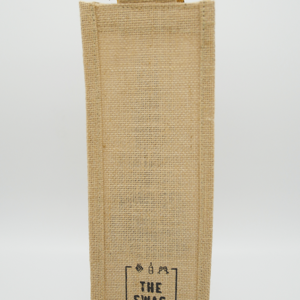 
                      
                        The Swag wine carry bag made from hessian with lovely bamboo handles and The Swag logo - The Swag AU
                      
                    
